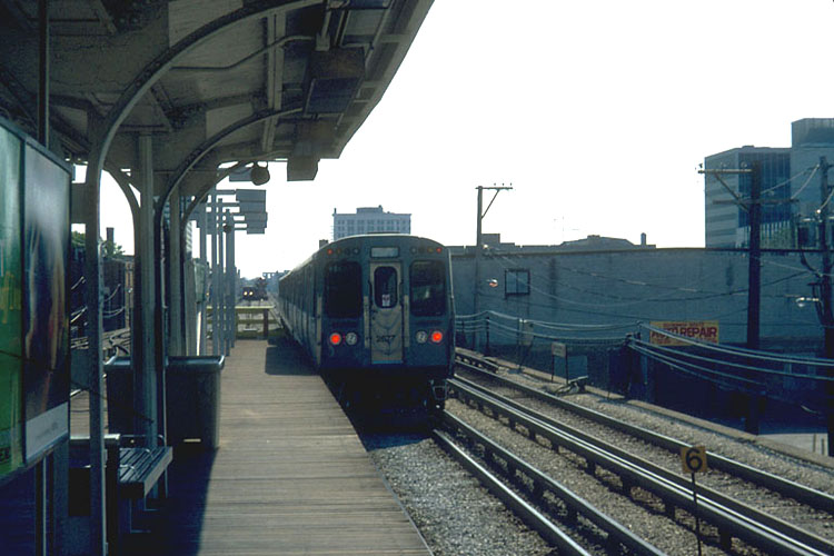  Car 2677 trails a southbound Red Line train as it pulls out of Berwyn 
